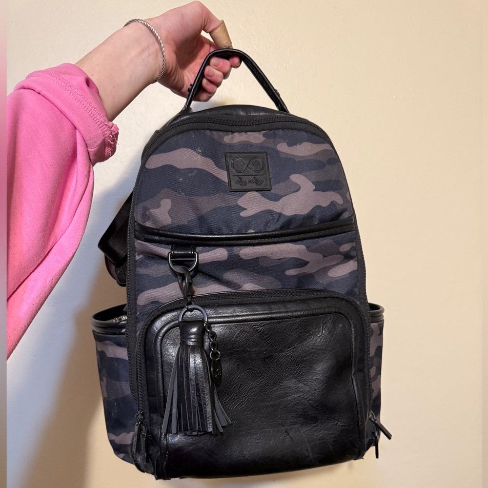 Itzy Ritzy Chelsea + Cole Camouflage Diaper Bag and Paci Holder included